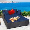 Spacious Outdoor Rattan Daybed with Upholstered Cushions and Pillows